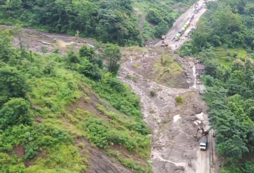 An aerial view of the massive landslide near Dziidza Bridge under Sechüi Zubza along National Highway-29 between Kohima-Dimapur. The landslide disrupts normal traffic for the past many days. (Image captured from DIPR visual)
